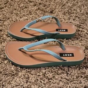 DKNY Turquoise Flip Flops Size 7. One Sandal Has A Small Red Mark, Seen In Photo